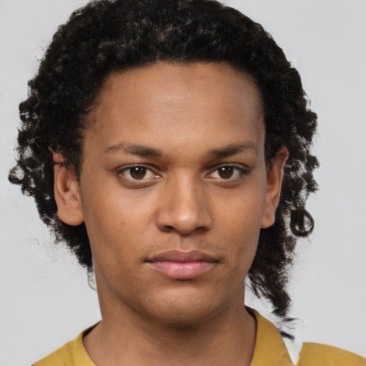Neutral black young-adult female with short  brown hair and brown eyes