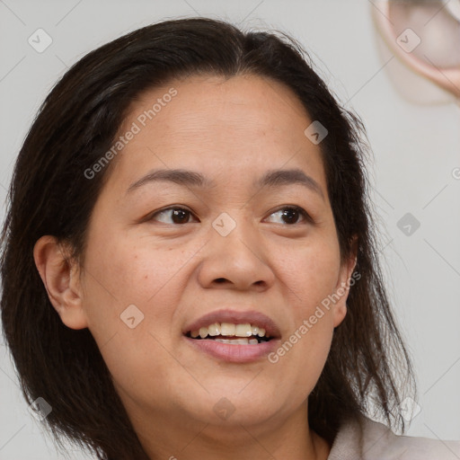 Joyful white adult female with medium  brown hair and brown eyes