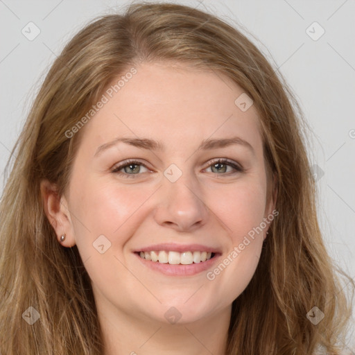 Joyful white young-adult female with long  brown hair and grey eyes