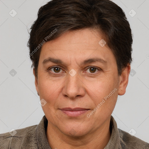 Joyful white adult female with short  brown hair and brown eyes