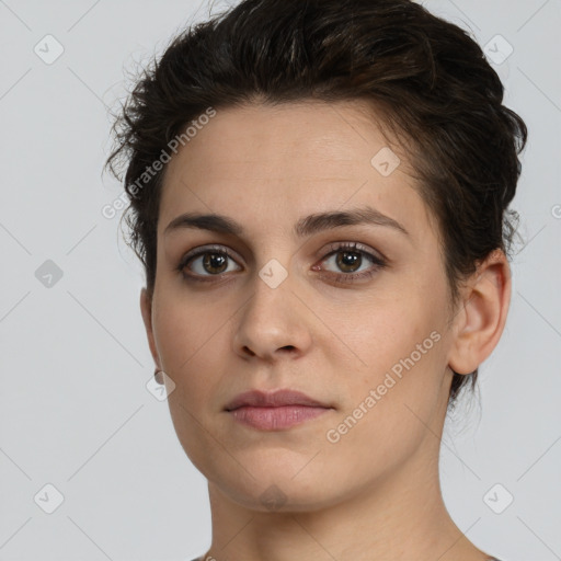 Neutral white young-adult female with short  brown hair and brown eyes