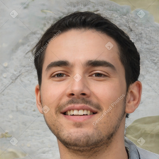 Joyful white young-adult male with short  black hair and brown eyes