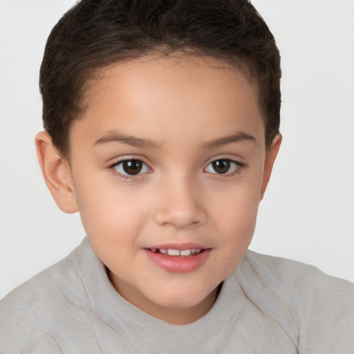 Joyful white child female with short  brown hair and brown eyes