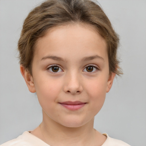 Joyful white child female with short  brown hair and brown eyes