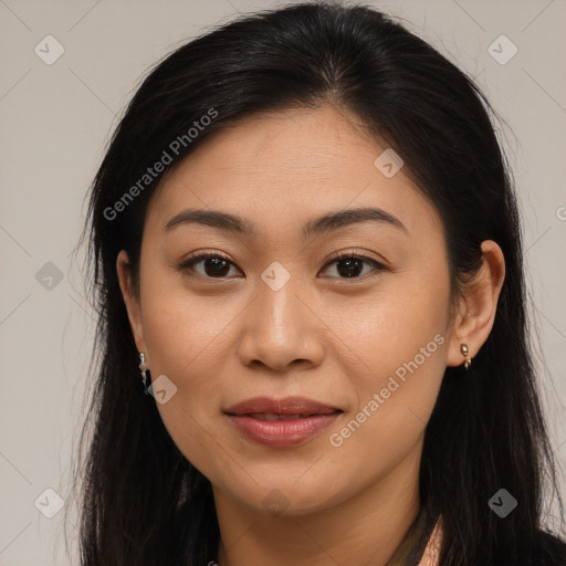 Joyful asian young-adult female with long  brown hair and brown eyes