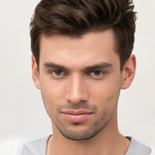 Neutral white young-adult male with short  brown hair and brown eyes