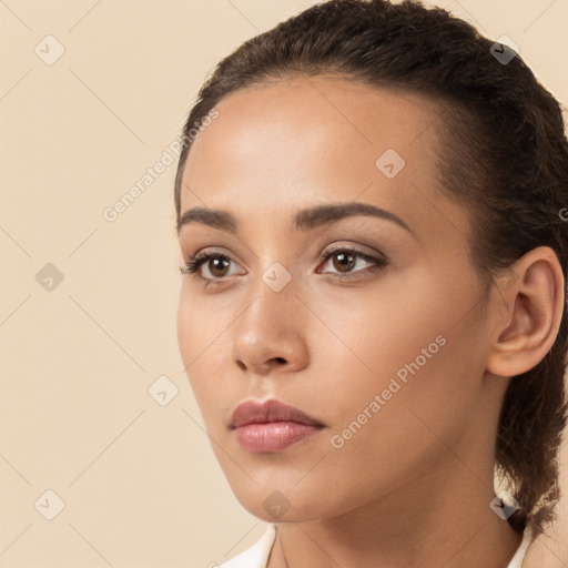 Neutral white young-adult female with long  brown hair and brown eyes