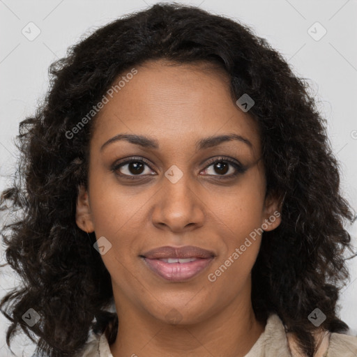 Joyful black adult female with medium  brown hair and brown eyes