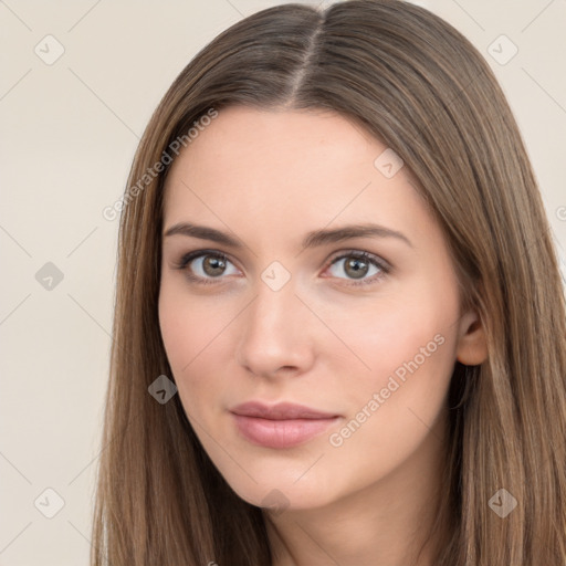 Neutral white young-adult female with long  brown hair and brown eyes