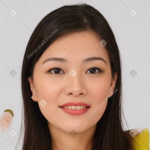 Joyful asian young-adult female with long  brown hair and brown eyes