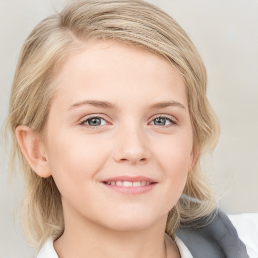 Joyful white child female with medium  brown hair and blue eyes