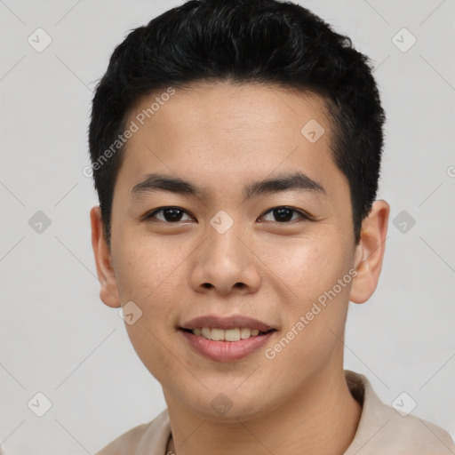 Joyful asian young-adult male with short  black hair and brown eyes