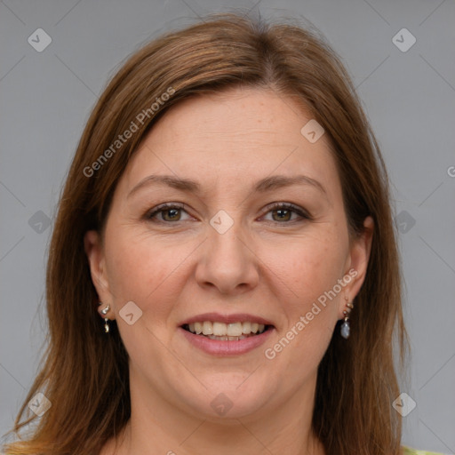 Joyful white adult female with medium  brown hair and brown eyes