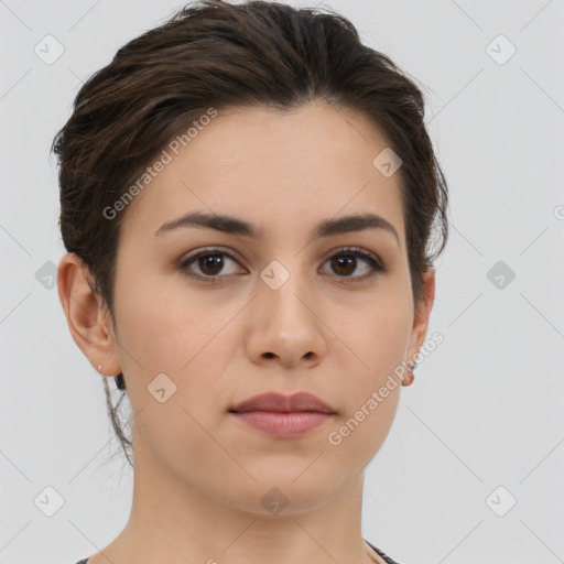 Neutral white young-adult female with short  brown hair and brown eyes