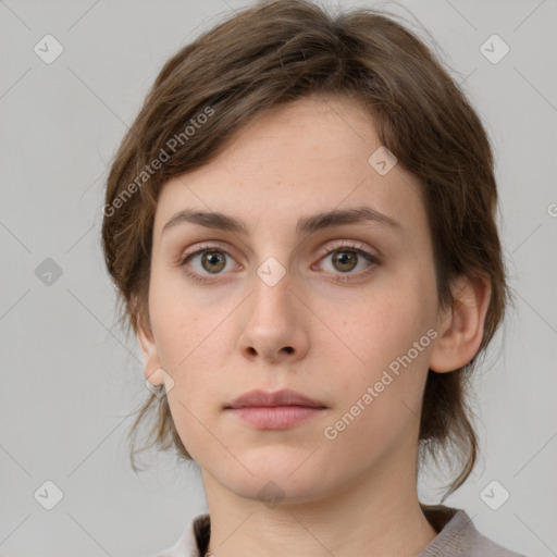 Neutral white young-adult female with medium  brown hair and grey eyes