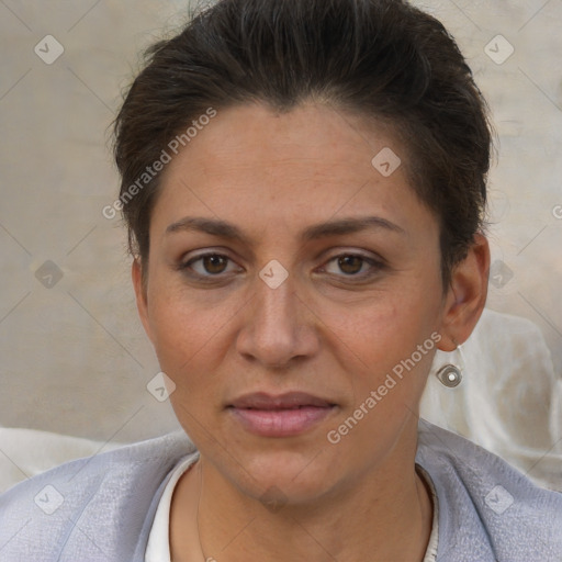 Joyful white adult female with short  brown hair and brown eyes