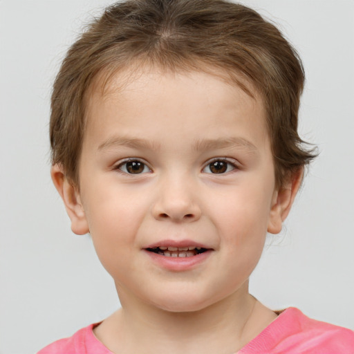 Joyful white child female with short  brown hair and brown eyes