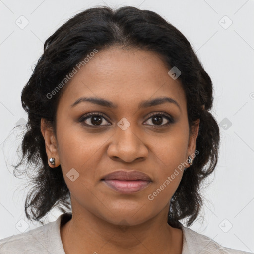 Joyful black young-adult female with medium  brown hair and brown eyes