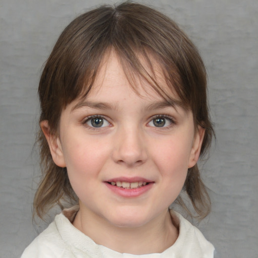 Joyful white child female with medium  brown hair and grey eyes