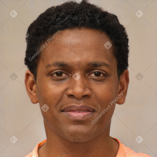 Joyful black young-adult male with short  brown hair and brown eyes