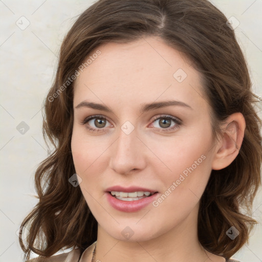 Joyful white young-adult female with medium  brown hair and green eyes