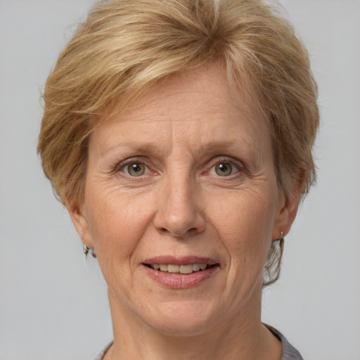 Joyful white middle-aged female with short  brown hair and brown eyes