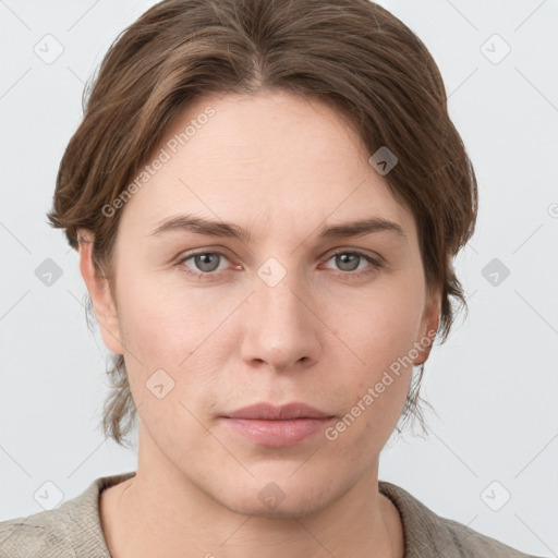 Neutral white young-adult female with medium  brown hair and grey eyes