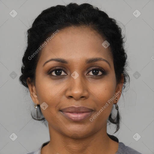 Joyful black young-adult female with medium  brown hair and brown eyes