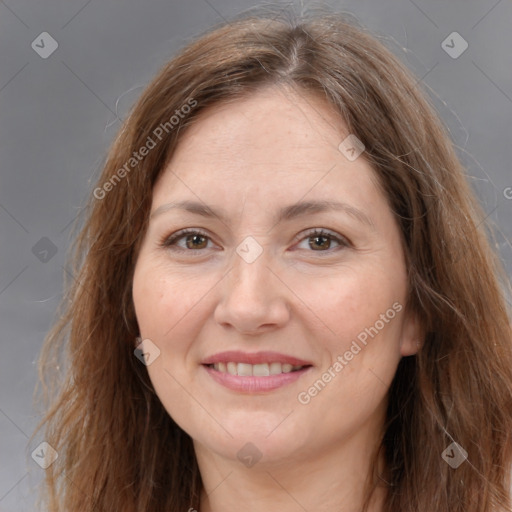 Joyful white adult female with long  brown hair and brown eyes