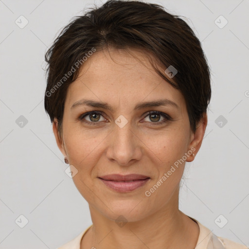 Joyful white adult female with short  brown hair and brown eyes