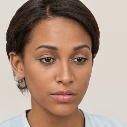 Neutral white young-adult female with short  brown hair and brown eyes