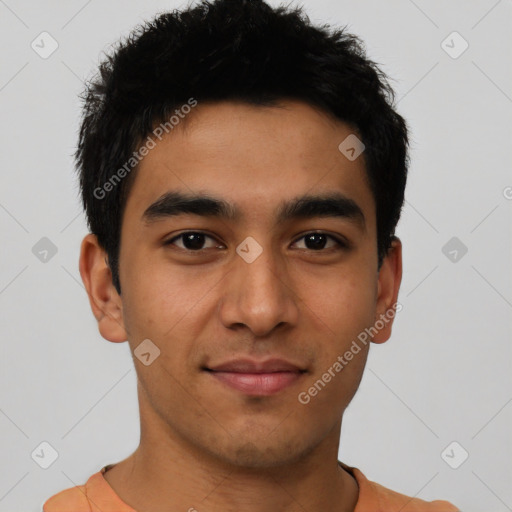 Joyful latino young-adult male with short  black hair and brown eyes