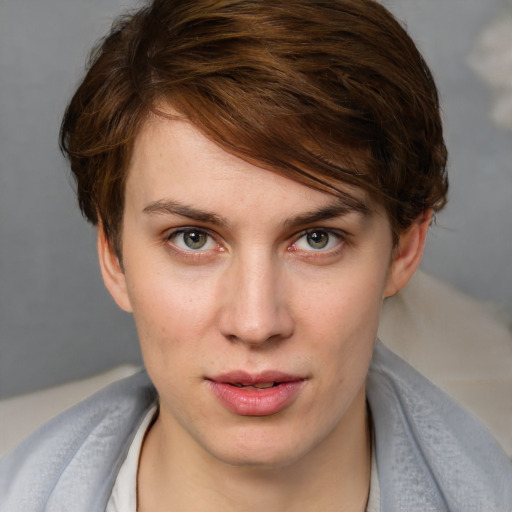 Joyful white young-adult female with medium  brown hair and blue eyes