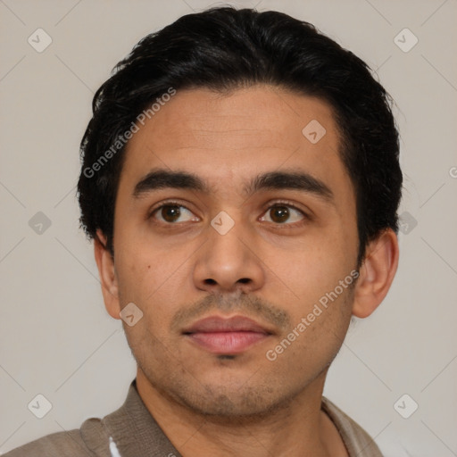 Neutral latino young-adult male with short  black hair and brown eyes