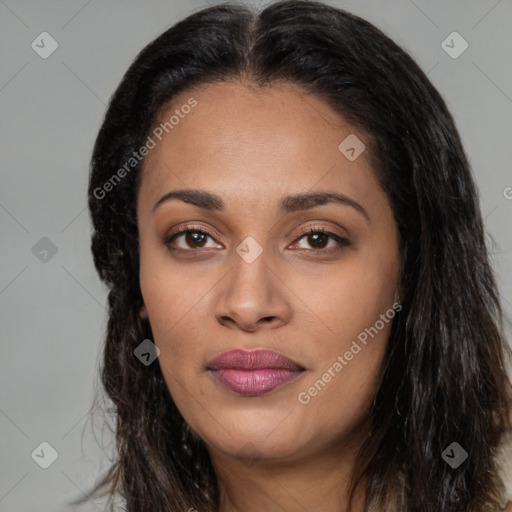 Joyful black young-adult female with long  brown hair and brown eyes