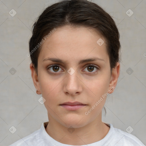 Neutral white young-adult female with short  brown hair and brown eyes