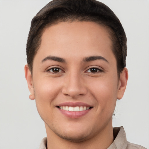 Joyful white young-adult female with short  brown hair and brown eyes