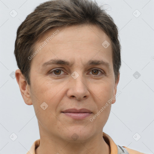 Joyful white adult female with short  brown hair and brown eyes