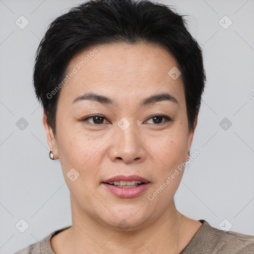 Joyful asian young-adult female with short  brown hair and brown eyes