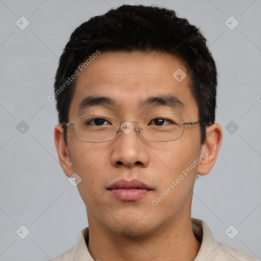 Neutral asian young-adult male with short  black hair and brown eyes