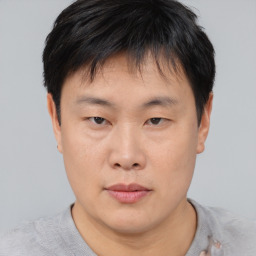 Neutral asian young-adult male with short  brown hair and brown eyes