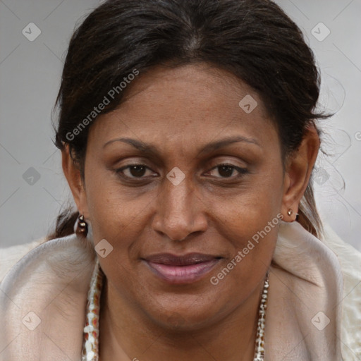 Joyful black adult female with short  brown hair and brown eyes