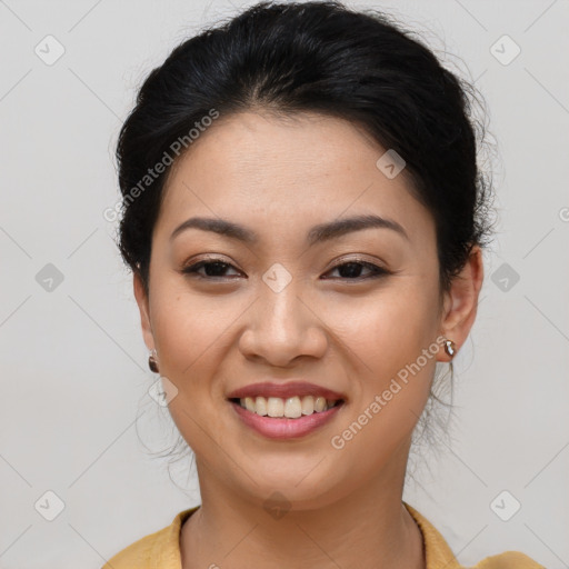 Joyful asian young-adult female with long  brown hair and brown eyes