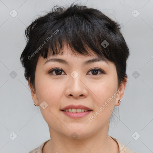 Joyful asian young-adult female with short  brown hair and brown eyes