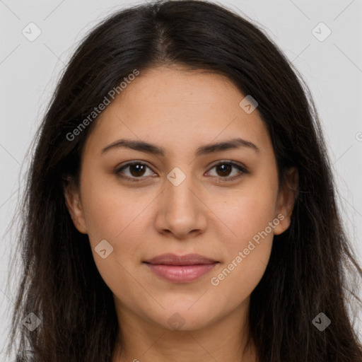 Joyful latino young-adult female with long  brown hair and brown eyes