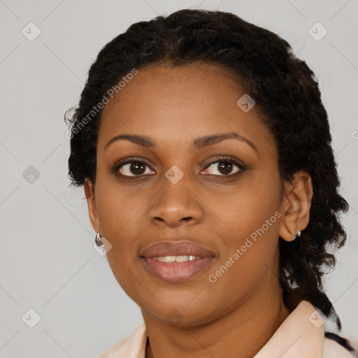 Joyful black young-adult female with medium  black hair and brown eyes