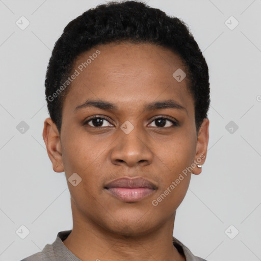 Joyful black young-adult male with short  brown hair and brown eyes