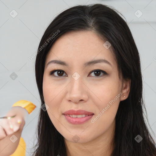 Joyful asian young-adult female with medium  brown hair and brown eyes