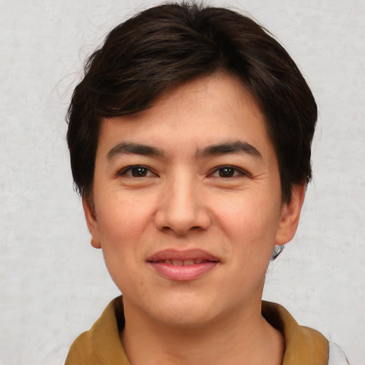 Joyful white young-adult male with medium  brown hair and brown eyes
