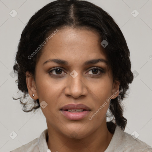 Joyful black young-adult female with medium  brown hair and brown eyes